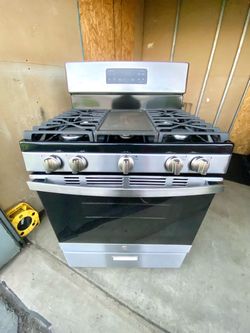 GE gas stove 5 burners stainless st with griddle.  30”