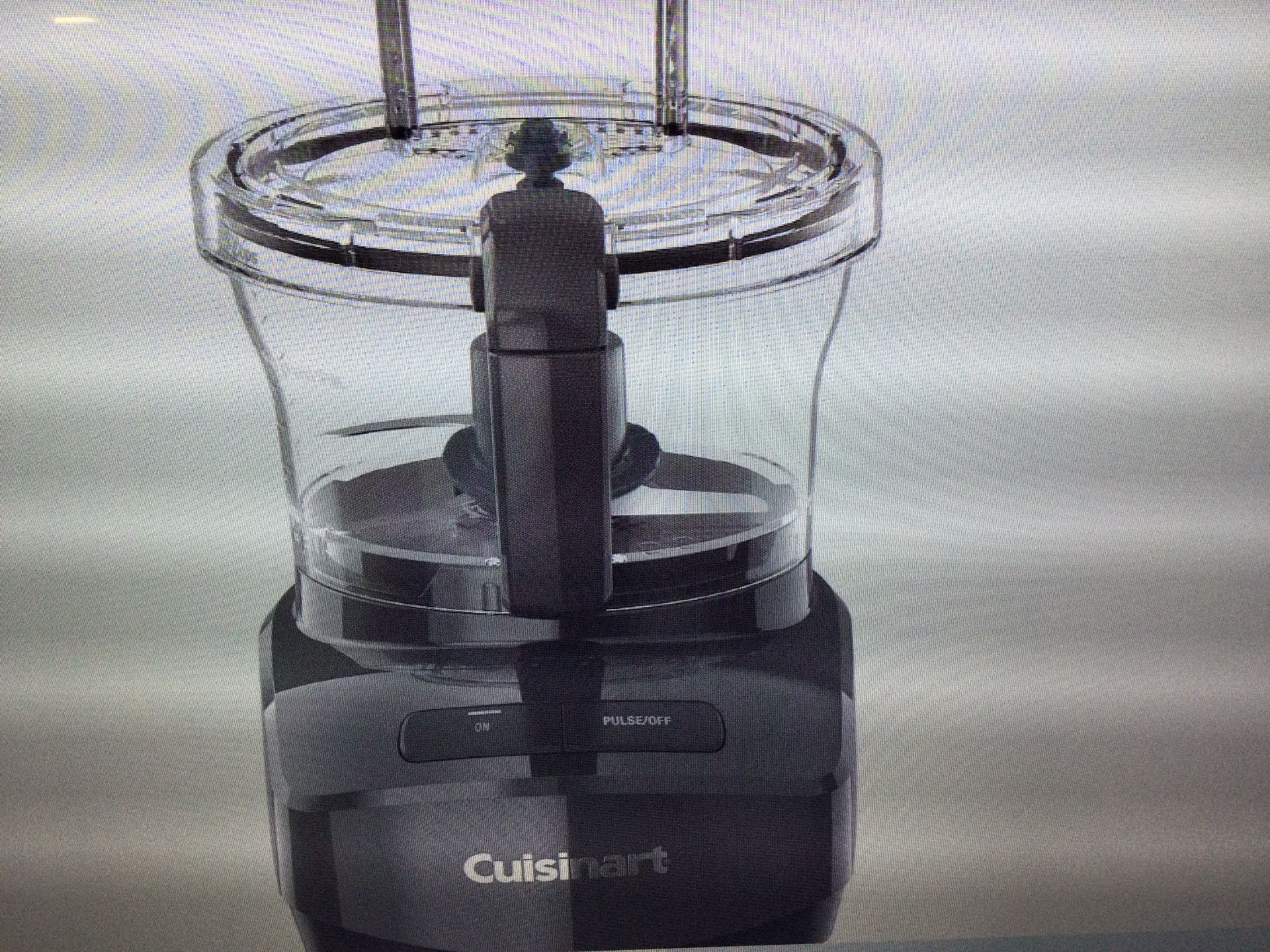 CUISINART 7 CUP FOOD PROCESSOR COMES COMPLETE…OPEN BOX ITEM RETAILS AT 129.95 PLUS TAX