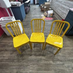 3 Yellow Metal Chairs