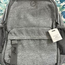 Pink backpack & Clothing pieces  