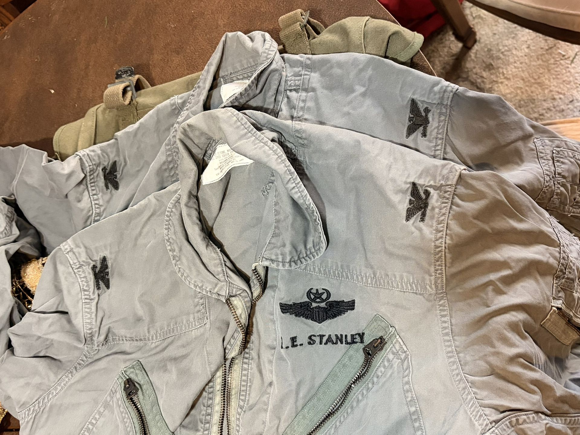 Vietnam War Pilots Flight Suits And A Case