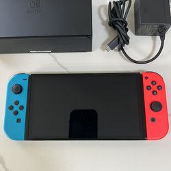 Nintendo Switch OLED Console with Neon Blue and Red JoyCon Controllers