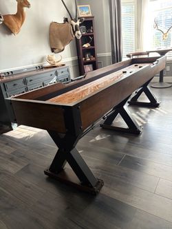 9’ very nice wood & wrought iron shuffle board table from Costco