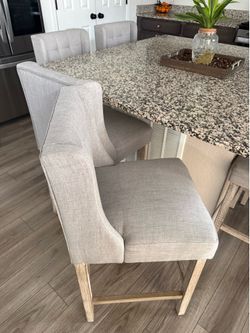 Four Gray Back/Wooden Base Kitchen Chairs