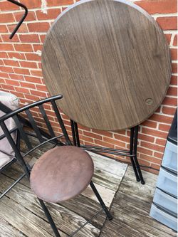 White table with one chair available.