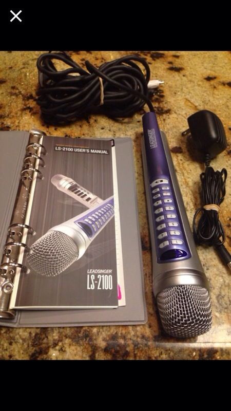 Lead singer LS 2100 karaoke microphone and chips. Used, $Lead singer LS 2100 karaoke system. Works with your television, pre-loaded with 100 songs al