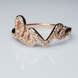 Rose Gold Plated LOVE Ring. Size 6