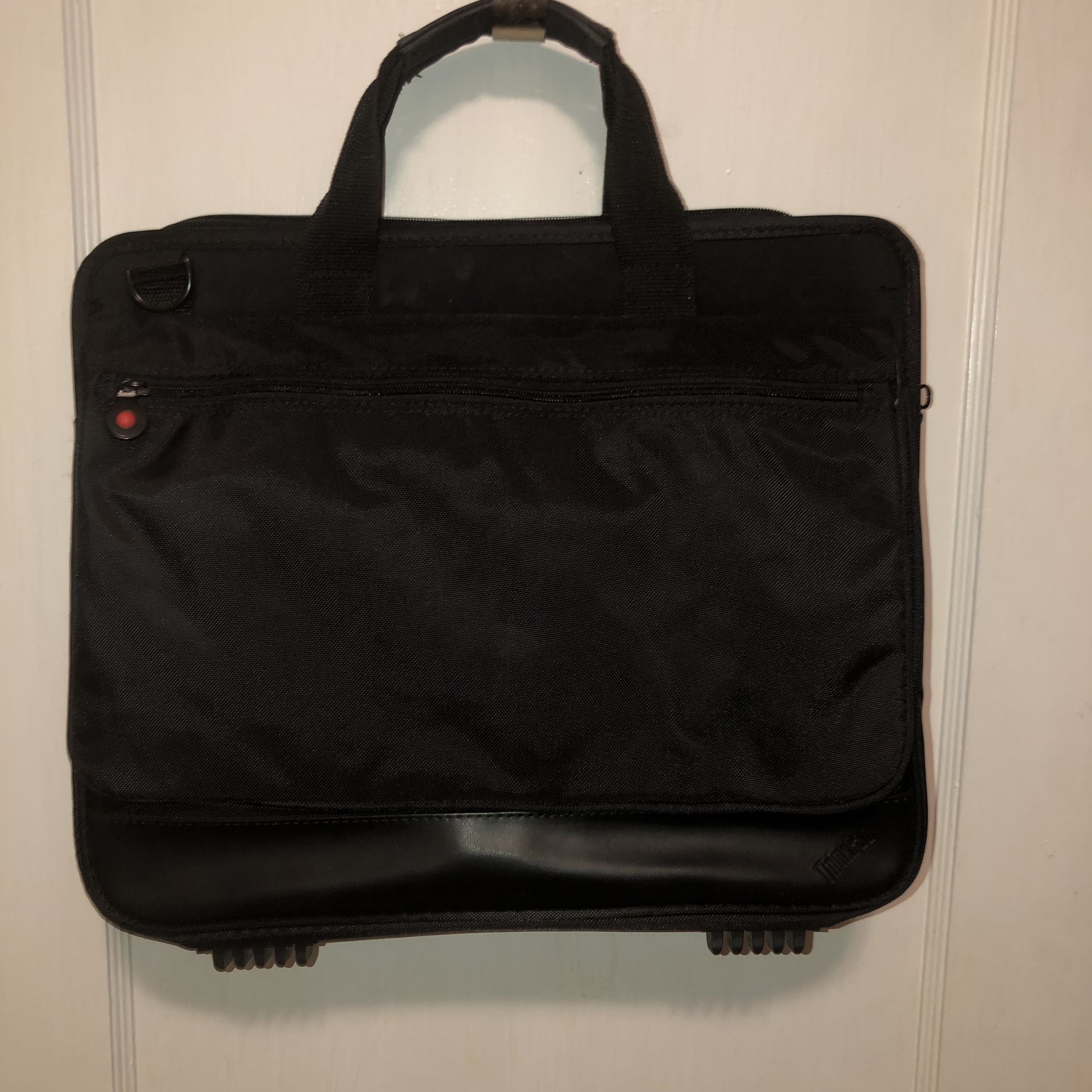 XL ThinkPad black laptop/computer bag/case with a padded section to protect your computer and lots of other compartments and velcro and zipper openin