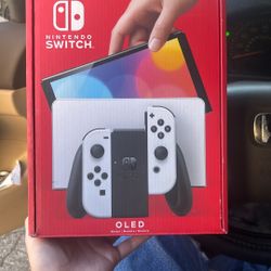 Nintendo Switch (OLED) with Mario Kart 8 Deluxe