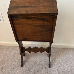 Vintage Antique Solid Wood Standing Sewing Knitting Cabinet Chest, curved bottom, double hinged top doors, 26”H x 12”W x 12”D, good condition.