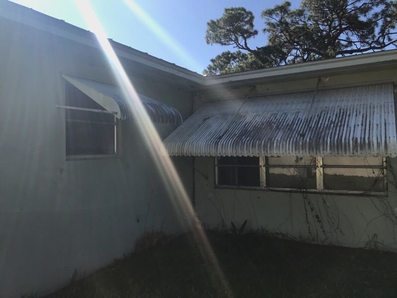 Six clamshell hurricane shutters for sale. for Sale in Stuart, FL OfferUp