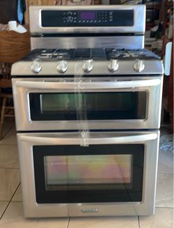 KitchenAid  double fuel:gas /electric . Stove double oven. Five burners