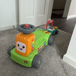 Fisher-Price Laugh & Learn 4-in-1 Farm to Market Tractor Ride-On Learning Toy for Baby & Toddlers