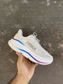 Women's Hoka Bondi 9 running shoes in the 'Cosmic Grey White Gradient' colorway. 