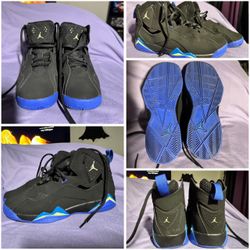 Black and royal blue Air Jordan true light sneaker