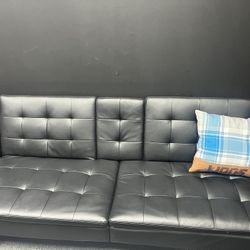 Two Leather Futon Couches
