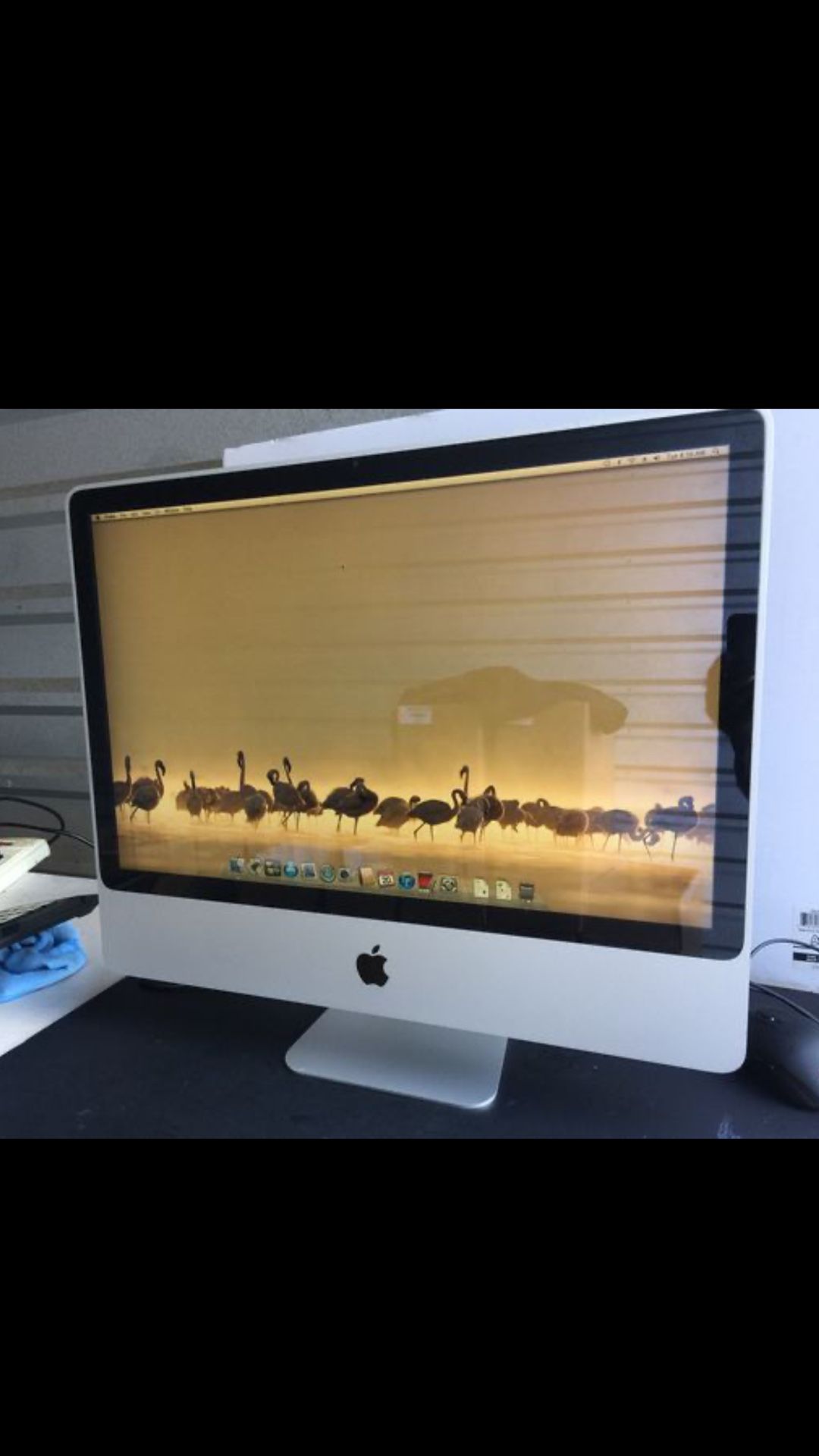 24” large screen All in one Apple iMac with black mouse and keyboard Mouse and keyboard the black one in the last picture It’s in excellent w