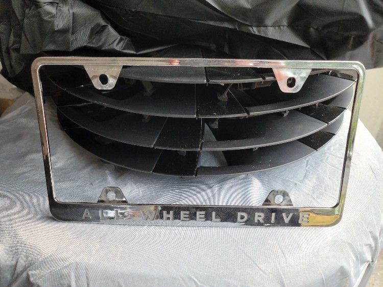 OEM Tesla License Plate Frame "ALL WHEEL DRIVE"