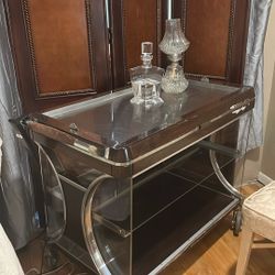 Two antique bars, stainless steel top plexiglass shelves. I have two of them. One is a little smaller than the other.