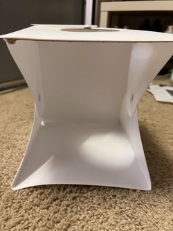 Photography box with LED lights and multi colored backdrops