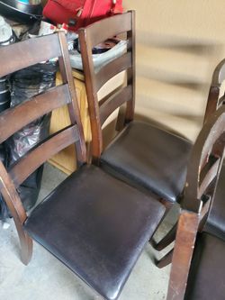 Set of four dining table chairs