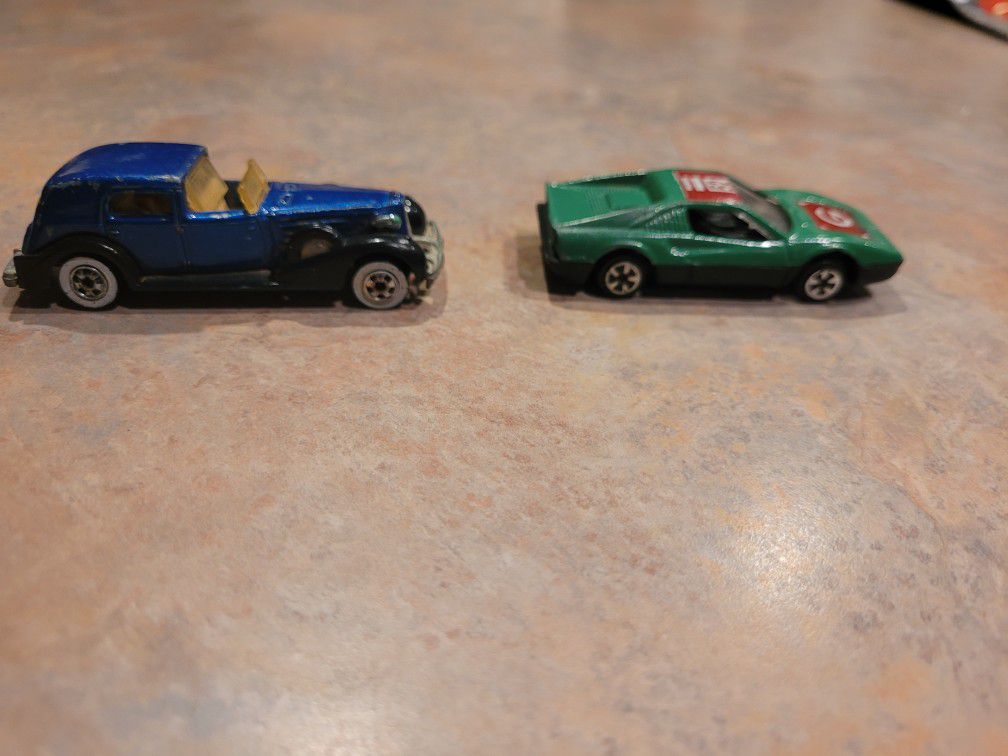 Diecast metal: Tow truck, 35  Cadillac, 67 Ford Mustang