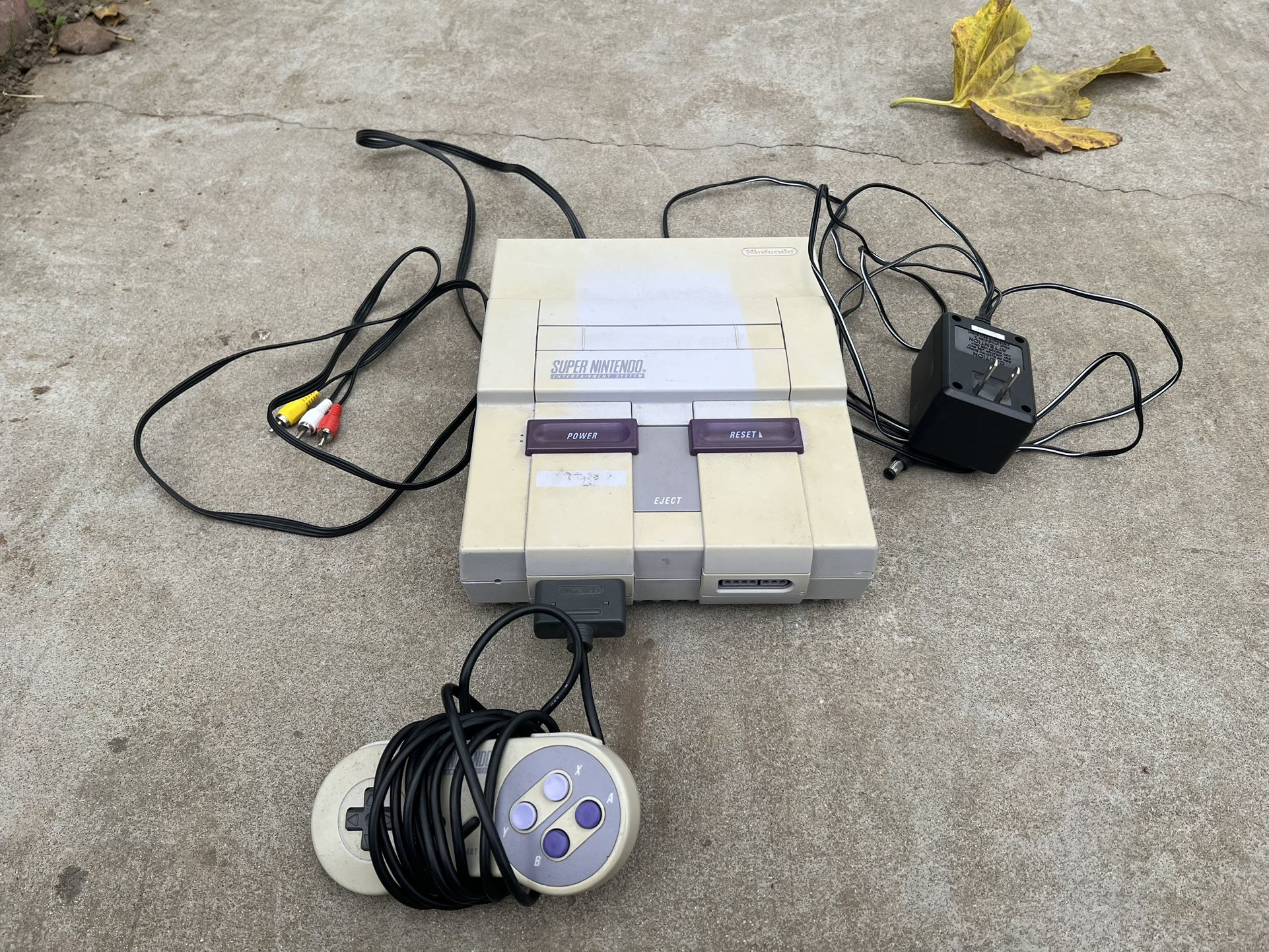 Super Nintendo and one Controller