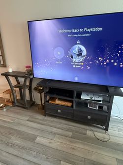 TV, TV Stand and a Stand