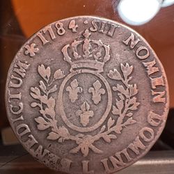 French silver Ecu coin minted in 1784 during the reign of Louis XVI.  