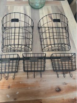 Black metal wall baskets
