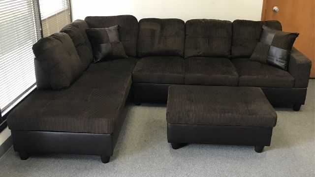 Dark brown sectional couch and storage ottoman