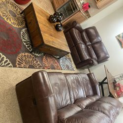 Two Leather Power Reclining Couches