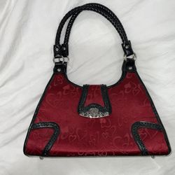 Black and red shoulder bag with silver hardware