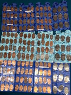 Lot of 120+ penny pressed coins from Disneyland