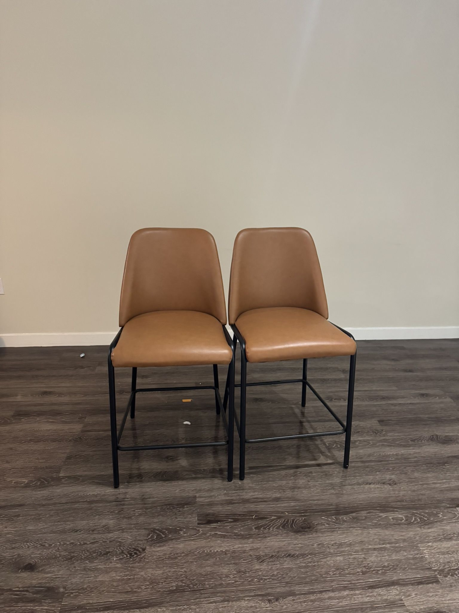 Two Leather Stools W/ Backs
