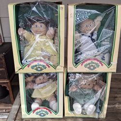 Set Of 4 Cabbage Patch Kids In Goid Condition 