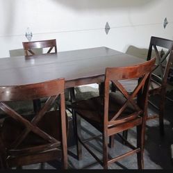 Tall Kitchen Table With Built-in Leaf And Four Bar Stools