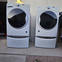 Whirlpool Front Load Washer and Electric Dryer Set with Pedistals 
