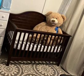 NEW CRIB MATRESS INCLUDED
