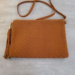 A Beautiful Brand New Purse  All leather. .  Size  . 30"×  11" .