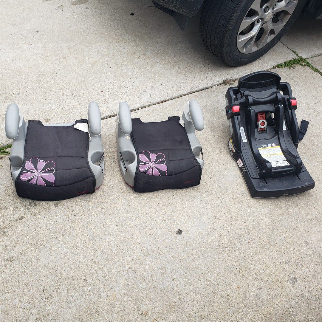Two Evenflo booster seats and a Graco base