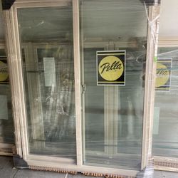 New window ,sliding , vinyl , almond , integrated screens ,47 1/2 by 59