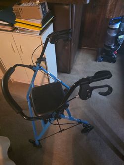 4 wheel walker w brakes, seat and foldable