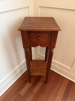 Wooden side table with drawer