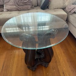 round glass top coffee table dark wood base