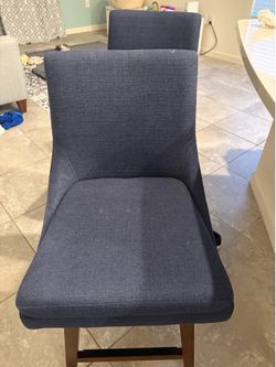 2 Blue barstool chairs that swivel from wayfair