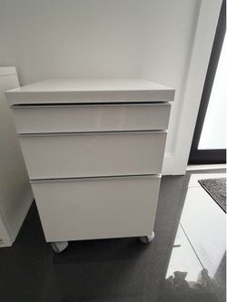 Filing cabinet drawer $40 Ikea white cabinet to hang on wall or on floor $70