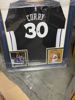 Signed curry jersey framed