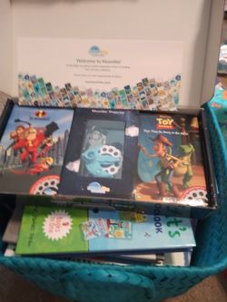 Moonlite story time projector and bin of 20+ childrens books