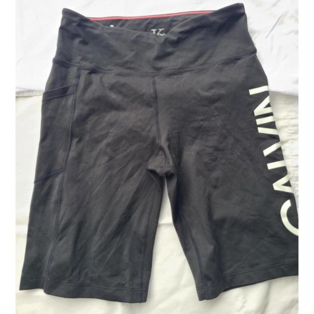 Black and white CALVIN KLIEN bike shorts workout shorts with a pocket for your phone
